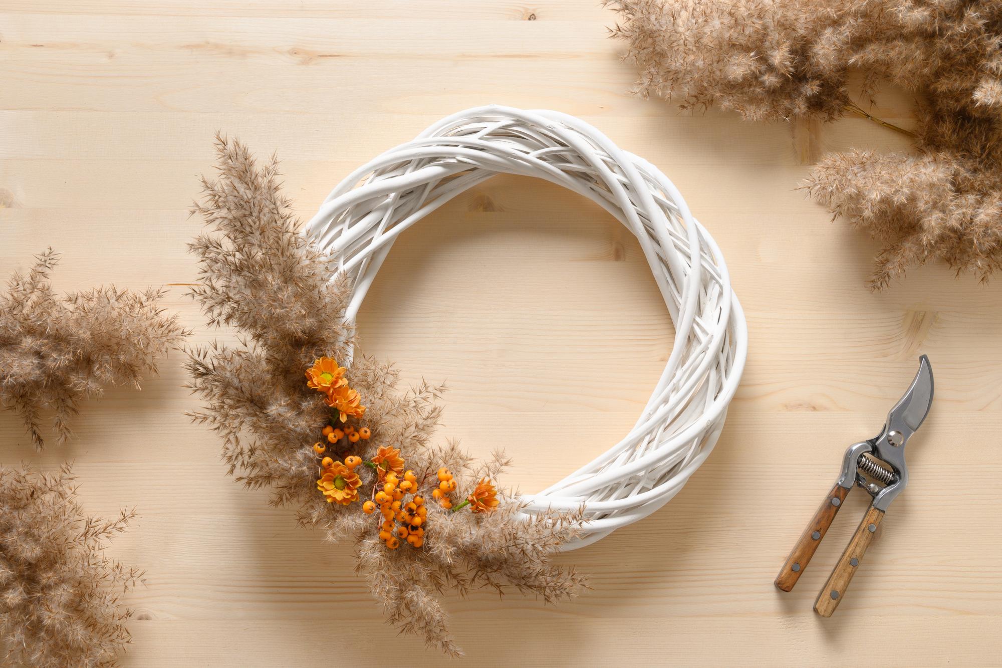 Workshop table with threads, hoops and sketches